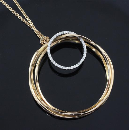 A Greek 18ct gold triple ring pendant by Poniros, with interlinked diamond set smaller ring, pendant  & an Italian chain,1.25in.